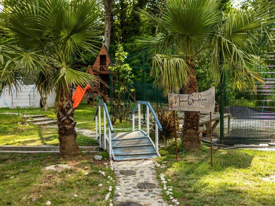 Grandeur Sapanca shared grounds &mdash; garden, pool and seating areas 5